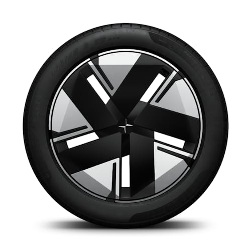 Polestar car wheel with black and silver geometric design.